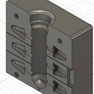 May include: A gray, three-dimensional mold with a cylindrical top and several cone-shaped cavities. The mold is cut open to reveal the internal structure, with a grid background.