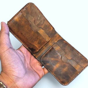 Cartera plegable con cera extraíble