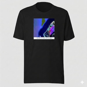 May include: A set of three ceramic mugs with a speckled, cream-colored glaze. Each mug features a different hand-painted floral design in shades of blue, green, and yellow. The mugs have a simple, rounded shape and a comfortable handle.