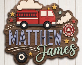 May include: Wooden sign featuring a red fire truck, clouds, stars, and the text "MATTHEW James". The sign has a rustic, layered design with a fire department emblem. A decorative piece for a child's room.
