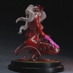 May include: A red figurine of a character in a cat-themed costume, with a mask and long white hair. The figure is posed in a crouching position, wearing pink gloves. The base is black with a gold trim.