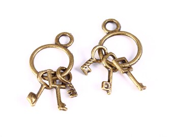 Antique brass Keys charm - keys pendant - 25mm x 13mm (1258)