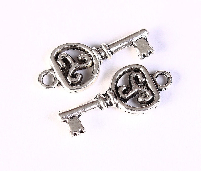 Filigree key charm pendant antique silver 22mm x 10mm Lead free 1334 image 1