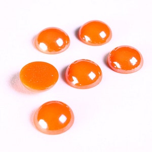 Cabochons en verre de forme ronde de couleur orange 11mm à 12mm (1307)
