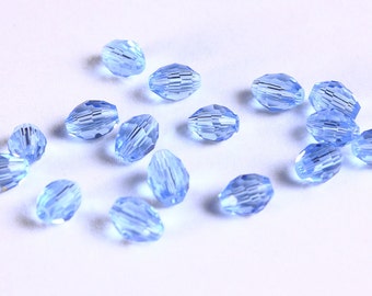 Blue rice beads - Blue oval beads - Blue faceted glass bead - 6mm x 4mm (1103)