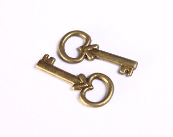 Petite key charm - Key pendant - antique brass Key charm - 22mm x 10mm - Lead free - nickel free (986---)