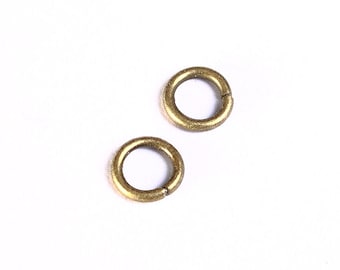 7mm antique brass jumpring - open jump rings - round jumprings - nickel free - lead free - cadmium free (989)