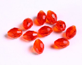 6mm x 4mm orange rice beads - orange oval glass beads - Orange faceted glass bead (1097)