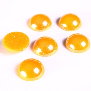 Cabochons en verre de forme ronde de couleur orange - 11mm à 12mm (1310)