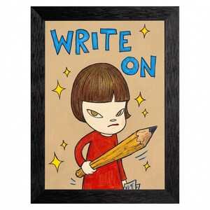 May include: Framed artwork featuring a cartoon figure in a red dress holding a large pencil. The words "WRITE ON" are in blue above the figure. Yellow star accents surround the figure and text. The artwork is set against a tan background.