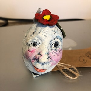 egg head art doll