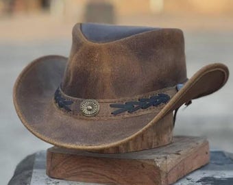 Cappello da cowboy in pelle marrone con fascia intrecciata e concho
