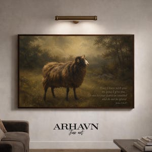 May include: A framed art print featuring a brown sheep in a field, with a forest background. The artwork includes the text "Peace I leave with you... Do not let your hearts be troubled and do not be afraid. John 14:27" and the brand name "ARHAVN Fine art."