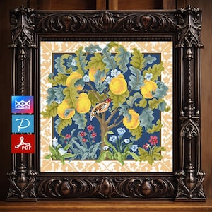 May include: Cross-stitch pattern of a tree laden with yellow fruit, a small bird, and flowers, set against a blue background. The artwork is framed in a dark, ornate wooden frame, with a decorative border. The image includes icons for digital downloads.