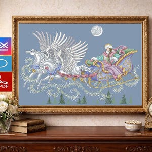 May include: A cross-stitch pattern design featuring two white winged horses pulling a blue and gold sleigh with a figure in a teal and pink outfit. The scene includes a moon, swirling white stars, and green trees against a light blue background.