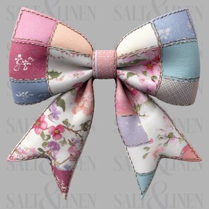 May include: A large fabric bow in a patchwork design, featuring pastel pinks, blues, and floral patterns. The bow has visible stitching and a solid pink centre. The design is reminiscent of a patchwork quilt, with a handcrafted aesthetic.