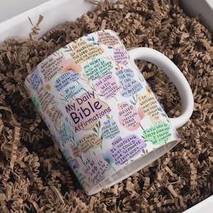 May include: A set of three ceramic mugs with a speckled, matte finish. Each mug features a different color: light blue, cream, and gray. The mugs have a simple, modern design and a comfortable handle. Perfect for coffee or tea.