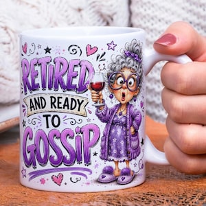 May include: A white ceramic mug featuring a cartoon illustration of an older person with gray hair, purple glasses, and a purple outfit, holding a wine glass. The text reads "RETIRED AND READY TO GOSSIP" in purple and black with pink heart accents.