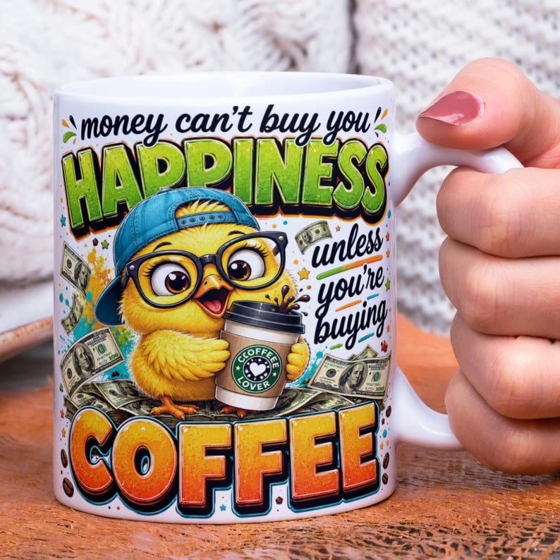May include: White ceramic coffee mug with a cartoon chick wearing glasses and a blue cap, holding a coffee cup. The mug has the text "money can't buy you happiness unless you're buying coffee" with dollar bills in the background.