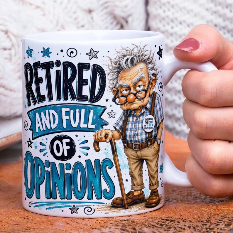 May include: A white ceramic mug featuring a cartoon illustration of an elderly person with glasses and a cane. The text reads "RETIRED AND FULL OF OPINIONS" in black and blue lettering, with a small badge stating "I'VE EARNED THE RIGHT TO SAY WHAT I THINK."