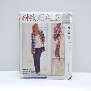 May include: A vintage McCall's sewing pattern packet featuring a woman in a plaid shirt, white top, and dark pants. The packet includes images of different outfits and the text "Easy McCall's". The pattern size is B (8, 10, 12).