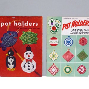 May include: Two vintage pot holder books. The red cover features whimsical designs of a fish, turtle, penguin, and snowman. The green cover displays various hot plate cover patterns with the text "POT HOLDERS".