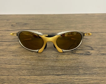 Retro Oakley Romeo X metal sunglasses feature brown polarized lenses y2k avantgarde hype