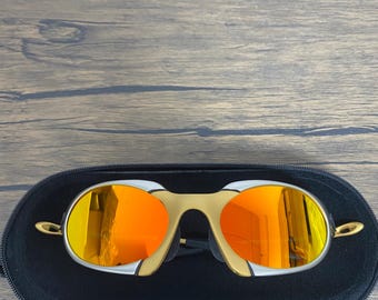 Retro Oakley Romeo X metal sunglasses feature orange gradient polarized lenses y2k avantgarde hype
