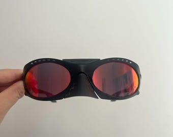Oakley Plantaris sunglasses Black frames red polarized lenses
