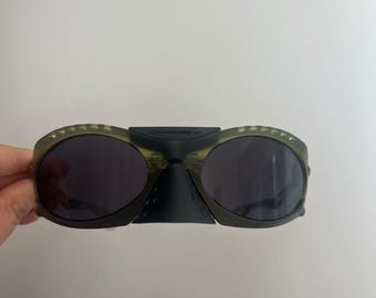 Oakley Plantaris sunglasses matte clear dark green frame black polarized lenses