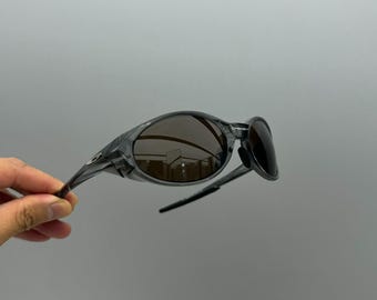 Retro Oakley Eye Jacket Redux sunglasses grey frame brown lens