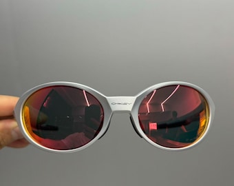 Retro Oakley eye jacket redux sunglasses silver frames red lens