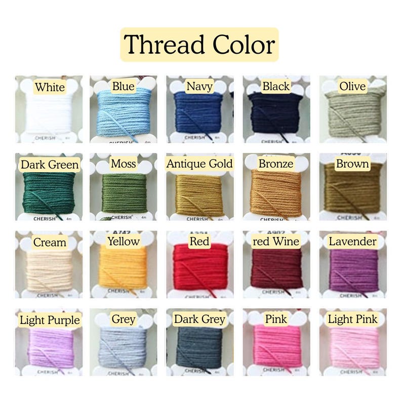 May include: A color chart displaying various thread colors, including white, blue, navy, black, olive, dark green, moss, antique gold, bronze, brown, cream, yellow, red, red wine, lavender, light purple, grey, dark grey, pink, and light pink. The text "Thread Color" is at the top.