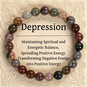 Może przedstawiać: Bransoletka z koralików w różnych kolorach, ułożonych w okrąg. Nad bransoletką napis "Depression", a pod nim tekst "Maintaining Spiritual and Energetic Balance, Spreading Positive Energy, Transforming Negative Energy into Positive Energy."