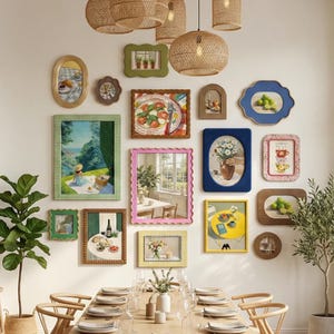 May include: A gallery wall featuring a collection of various framed art prints and mirrors in diverse shapes and colours, including scalloped, oval, and rectangular frames. The artwork depicts still life scenes, landscapes, and food illustrations.