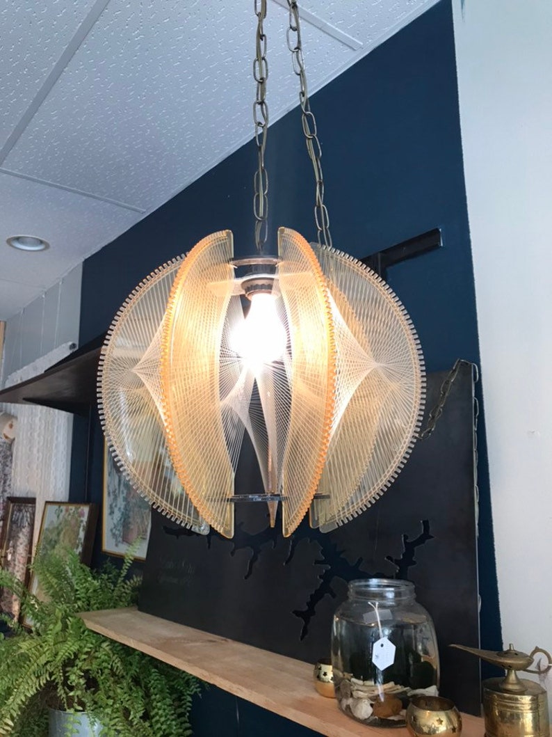 Mid Century String Swag Light Pale Orange And Lucite