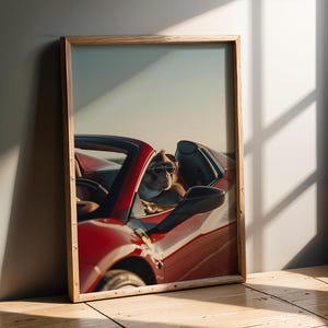 May include: A white ceramic mug with a black handle and the text "But First, Coffee" in a bold, black font. The mug is set against a blurred background, suggesting a cozy setting.