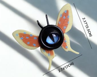 Broche de cabelo com olho de borboleta gótica, alfinete de borboleta com olho de demônio, acessório de cabelo com inseto gótico, joia de terror Weirdcore, moda alternativa.