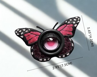 Broche de cabelo com olho de borboleta gótica, alfinete de borboleta com olho de demônio, acessório de cabelo com inseto gótico, joia de terror Weirdcore, moda alternativa.