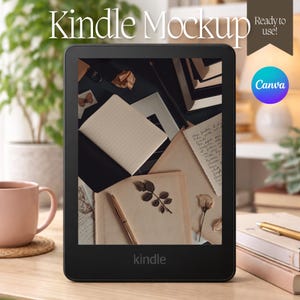 May include: A black Kindle e-reader displaying a mockup scene with vintage books, stationery, and botanical elements. The screen shows a pen, dried flowers, and handwritten notes. The word "Kindle" is printed at the bottom of the device.