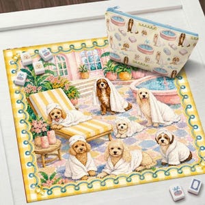 May include: A square mat and a zippered pouch featuring a repeating illustration of light brown dogs wearing white bathrobes and towels. The scene depicts the dogs in a spa setting with fountains, lounge chairs, and potted plants in pastel colors.