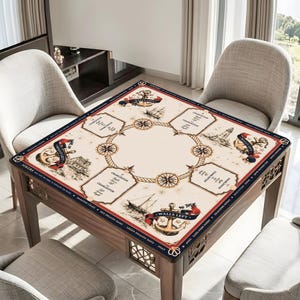 May include: A square mahjong table featuring a cream-colored surface with a nautical-themed print. The design includes anchors, sailboats, lighthouses, and compass roses connected by rope motifs, with text labels like Charleston and Walls Left.