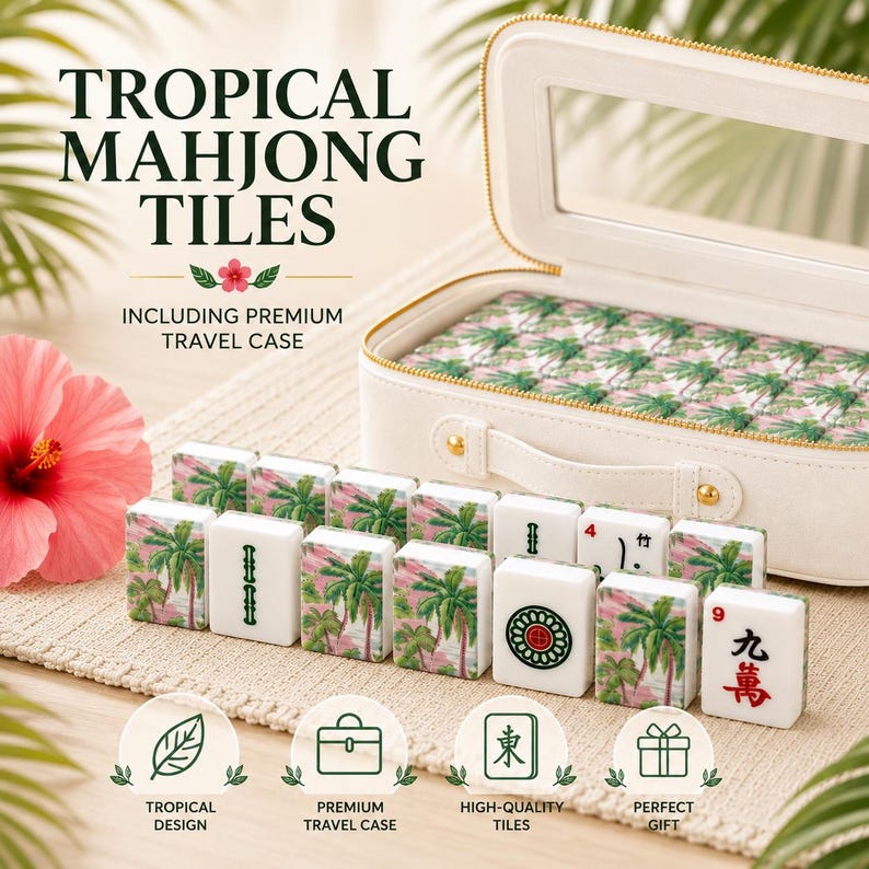 May include: White mahjong tiles with a tropical palm tree design, arranged in front of a white travel case. The case and tiles feature the text "TROPICAL MAHJONG TILES". A pink hibiscus flower is in the background.