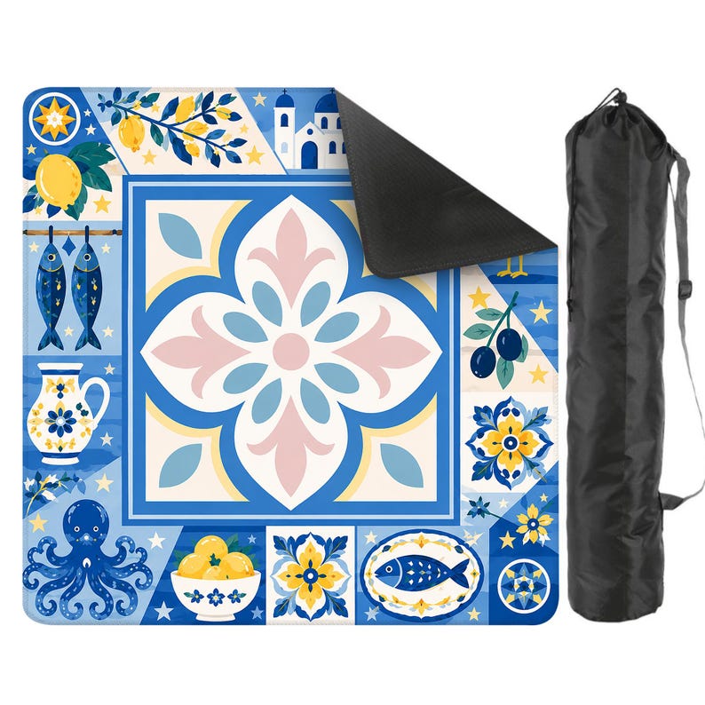 May include: A decorative yoga mat with a Mediterranean tile design in blue, white, yellow, and pink. The mat features lemons, fish, and an octopus. A black carrying bag is included.