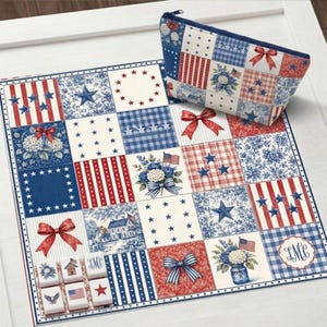May include: A square fabric mat and a matching zippered pouch featuring a patchwork design in red, white, and blue. The pattern includes stars, stripes, floral bouquets, bows, and a house illustration. Six small square tiles with similar motifs are included.