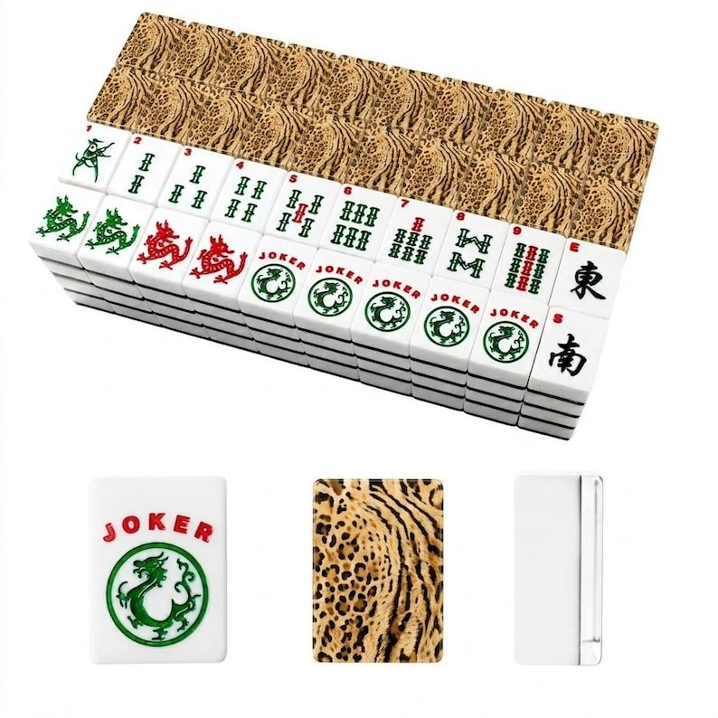 May include: A set of rectangular mahjong tiles featuring a white base with various green and red symbols, including dragons, numbers, and the word JOKER. The backs of the tiles display a brown and tan leopard print pattern on a textured surface.