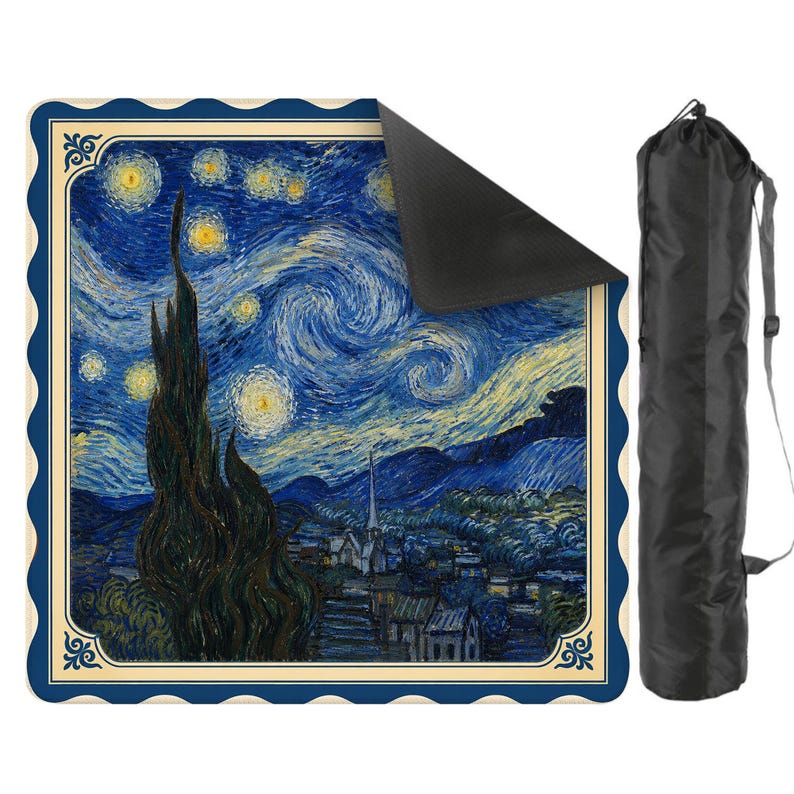 May include: A square outdoor mat featuring a reproduction of Vincent van Gogh's The Starry Night painting with a scalloped blue border and a cream frame. The mat has a black underside and is accompanied by a black cylindrical carrying bag with a strap.