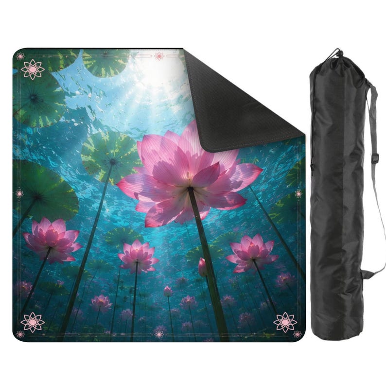May include: A yoga mat featuring a vibrant underwater scene with pink lotus flowers and lily pads. The mat has a black underside and is accompanied by a black carrying bag with a shoulder strap. The design evokes a sense of tranquility and nature.