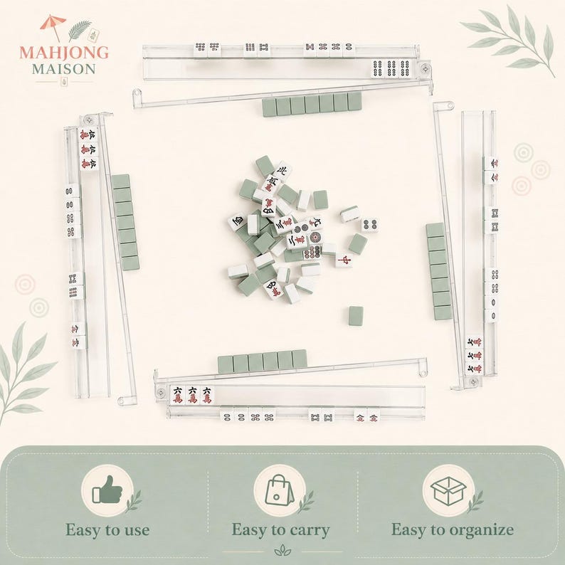 Puede incluir: Un juego de Mahjong con cuatro soportes de acr&iacute;lico transparente y una colecci&oacute;n de fichas blancas y verde salvia con marcas en rojo, negro y verde. El conjunto incluye un mont&oacute;n central de fichas y cuatro soportes en formaci&oacute;n cuadrada.