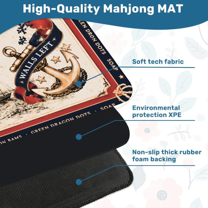 May include: A rectangular mahjong mat featuring a nautical design with a gold anchor, red ribbons, and the text WALLS LEFT and GREEN DRON DOTS SOAP. The mat consists of a soft tech fabric top, an environmental protection XPE layer, and a black rubber backing.